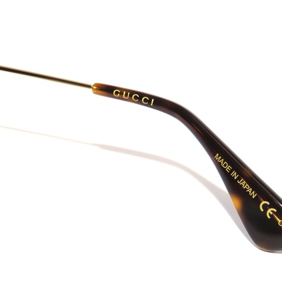 Gucci GG0106S 001 Black Gold Gray Sunglasses 0106 main image 4